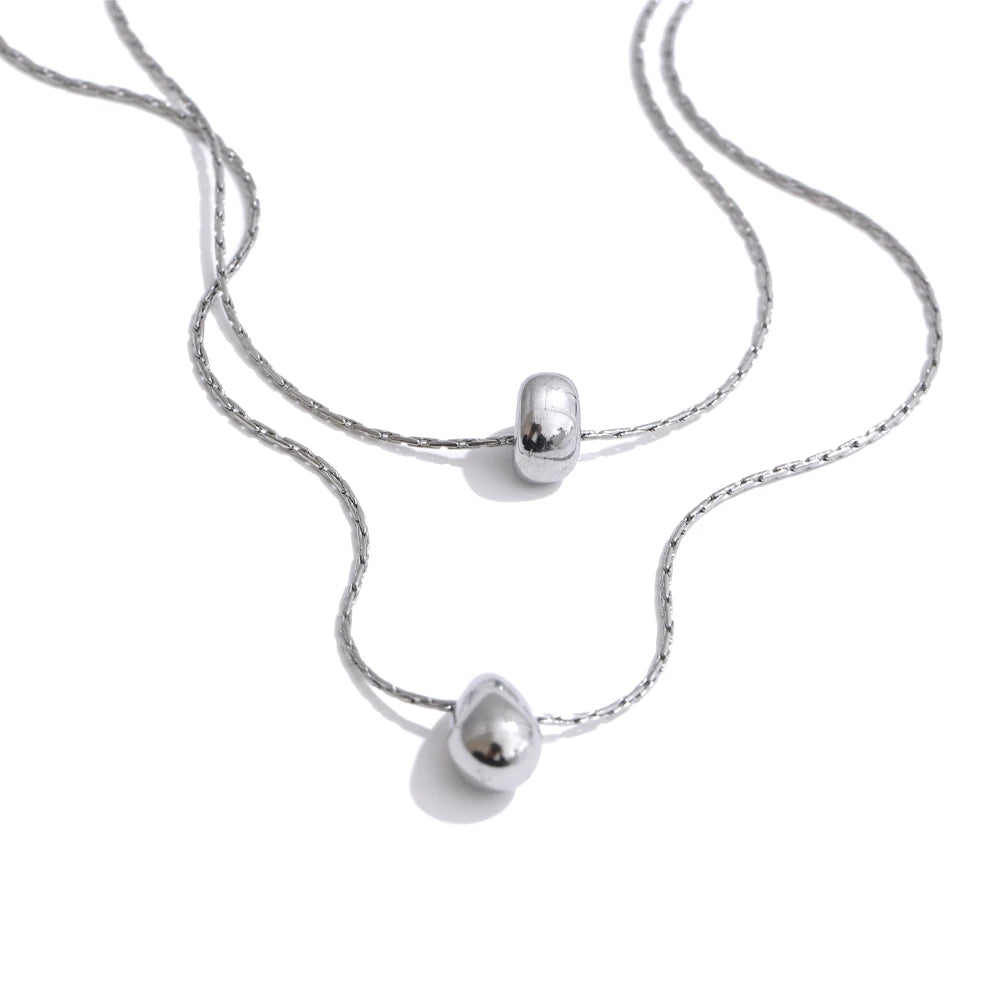 Collar de doble cadena con colgante de gota