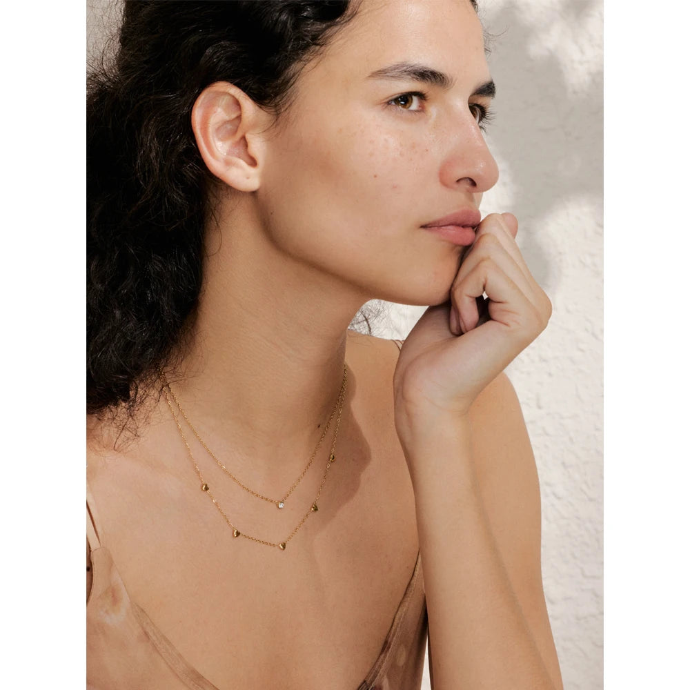 Collar de doble capa con corazón y circonitas