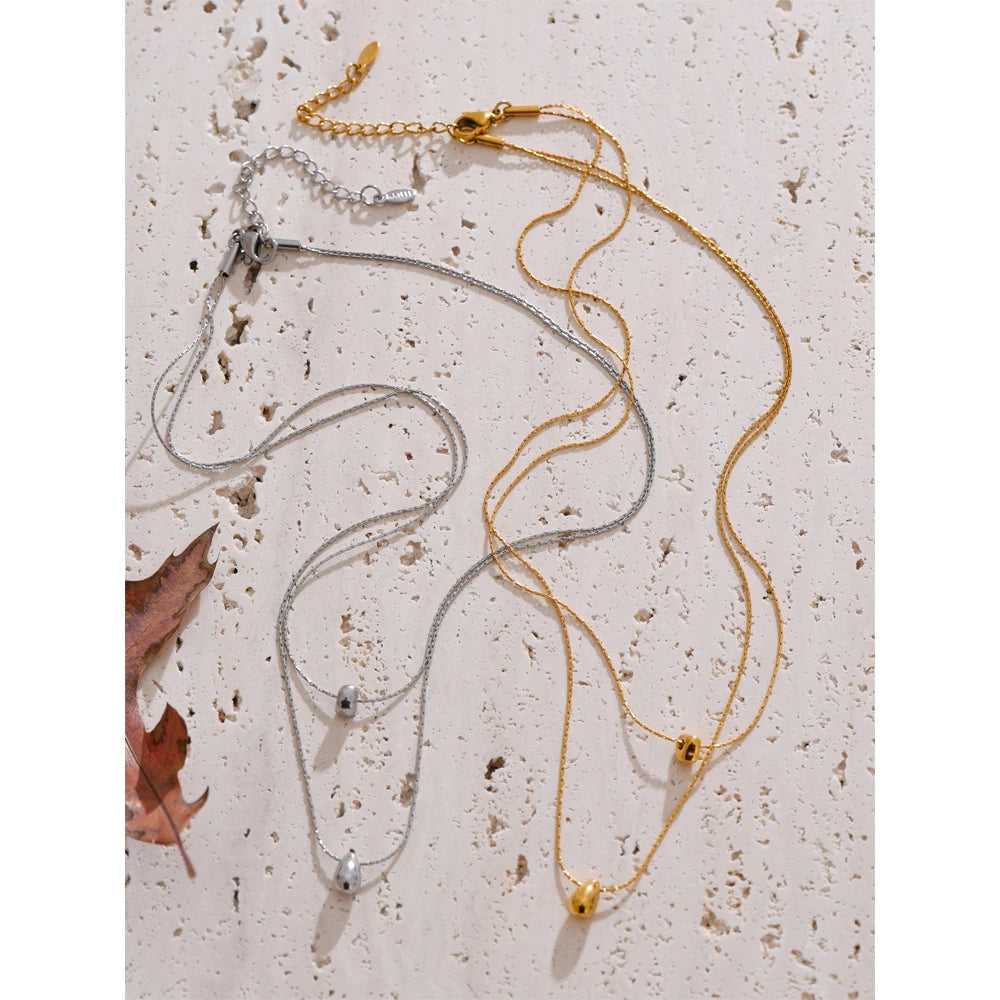 Collar de doble cadena con colgante de gota