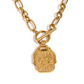Collar dorado con colgante rectangular reversible de sol y luna