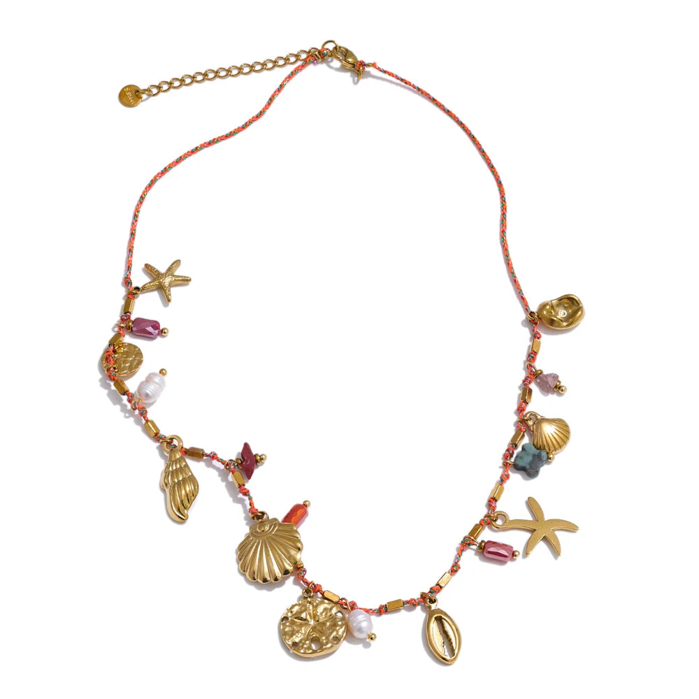 Joya de cordón con colgantes de concha y estrella