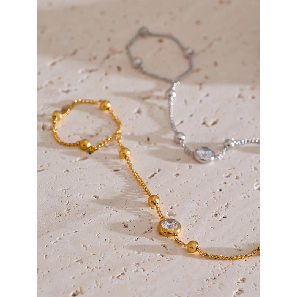 Pulsera de mano con cadena para el dedo y circonitas
