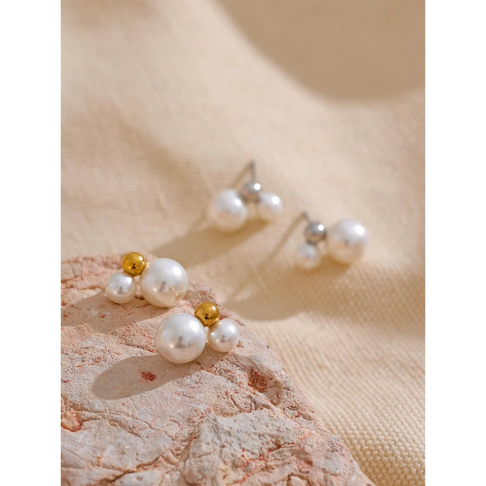 PENDIENTES DOBLE PERLA CON DETALLE DORADO