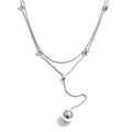 COLLAR DOBLE ASIMETRICO DORADO