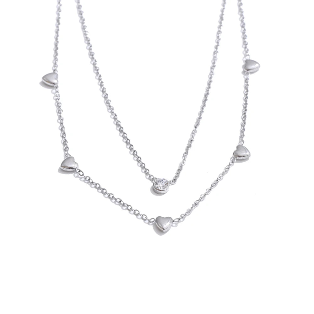 Collar de doble capa con corazón y circonitas