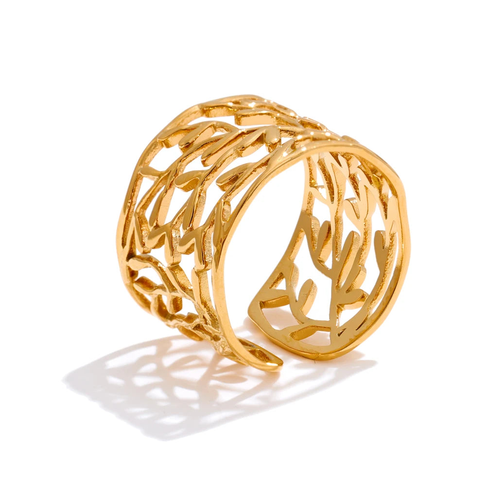 Anillo abierto dorado con diseño de hoja