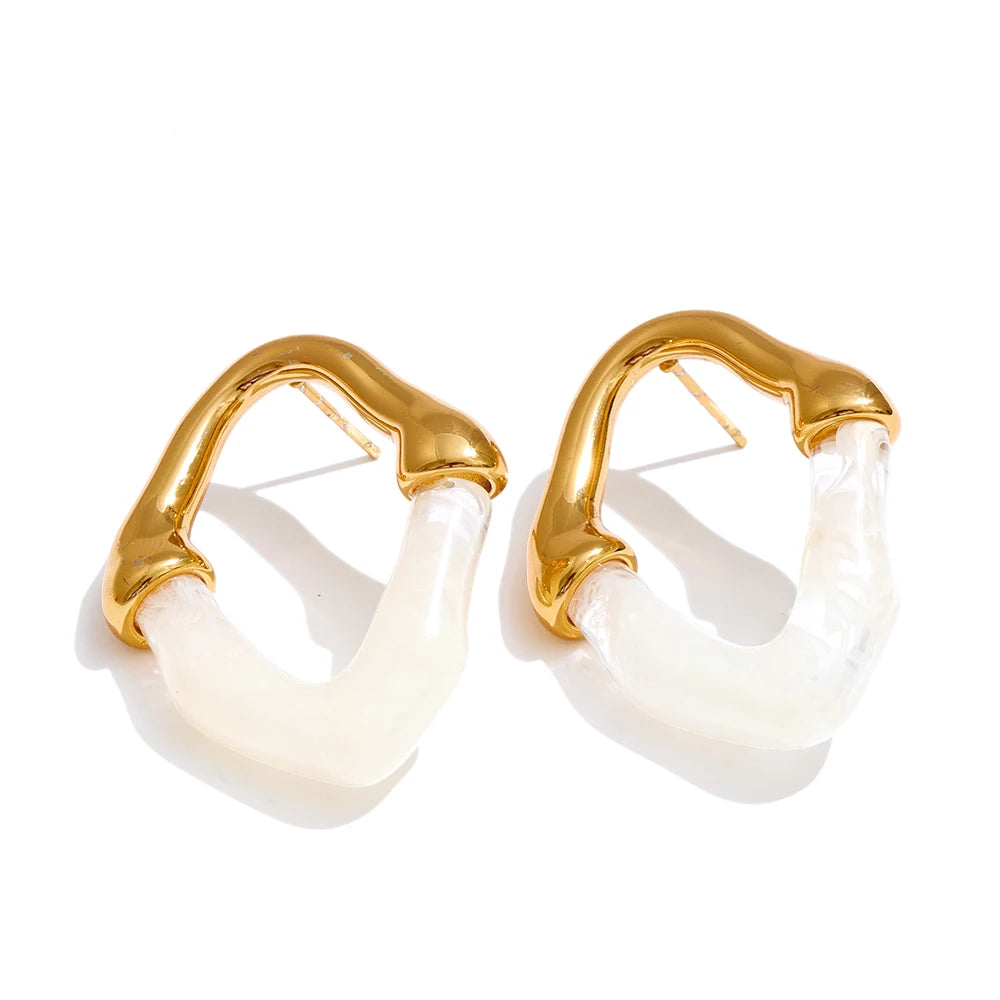 Pendientes geométricos de resina y acero inoxidable