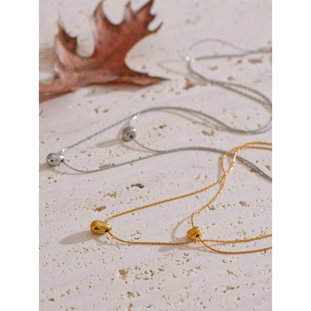 Collar de doble cadena con colgante de gota