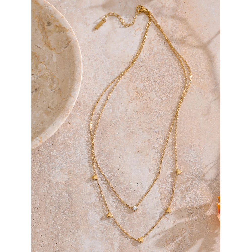 Collar de doble capa con corazón y circonitas