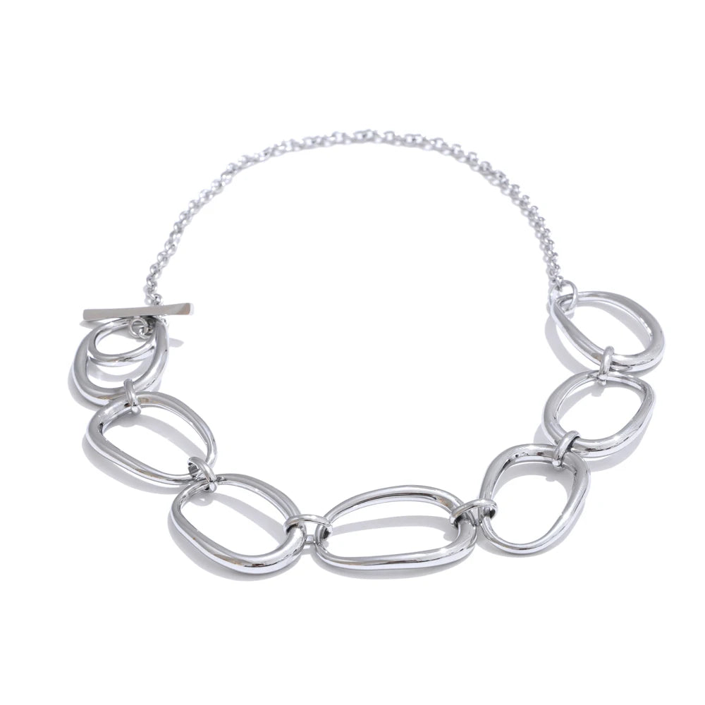 Collar dorado de eslabones orgánicos · Aria