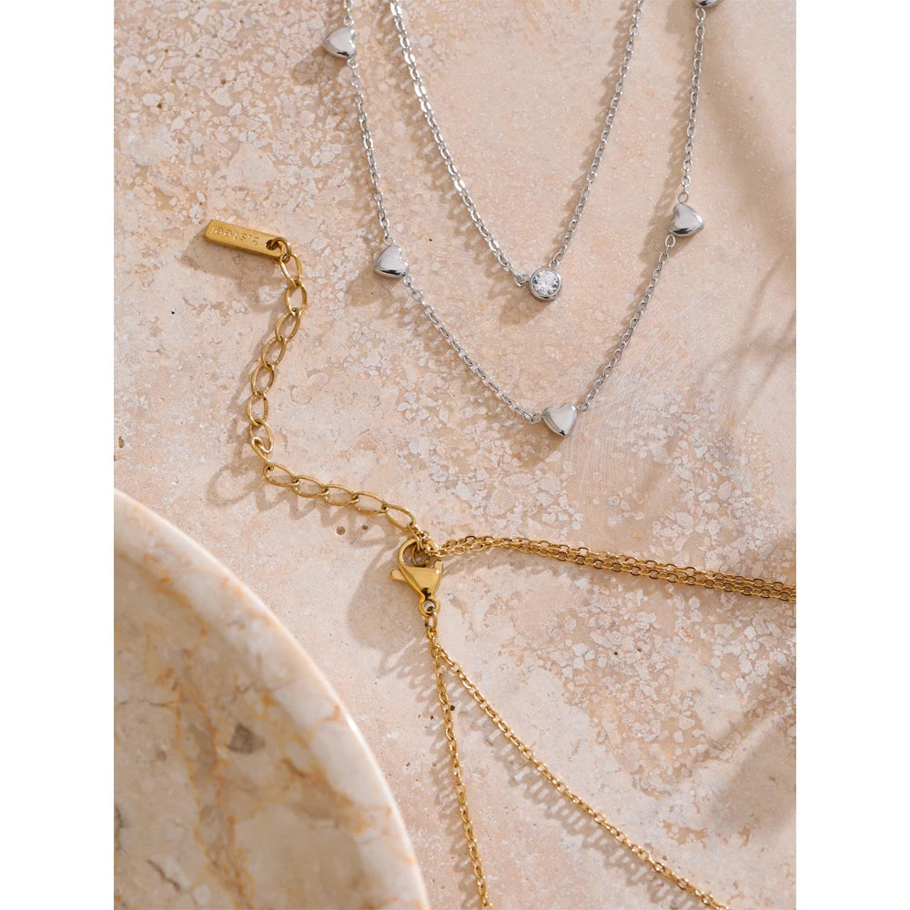 Collar de doble capa con corazón y circonitas