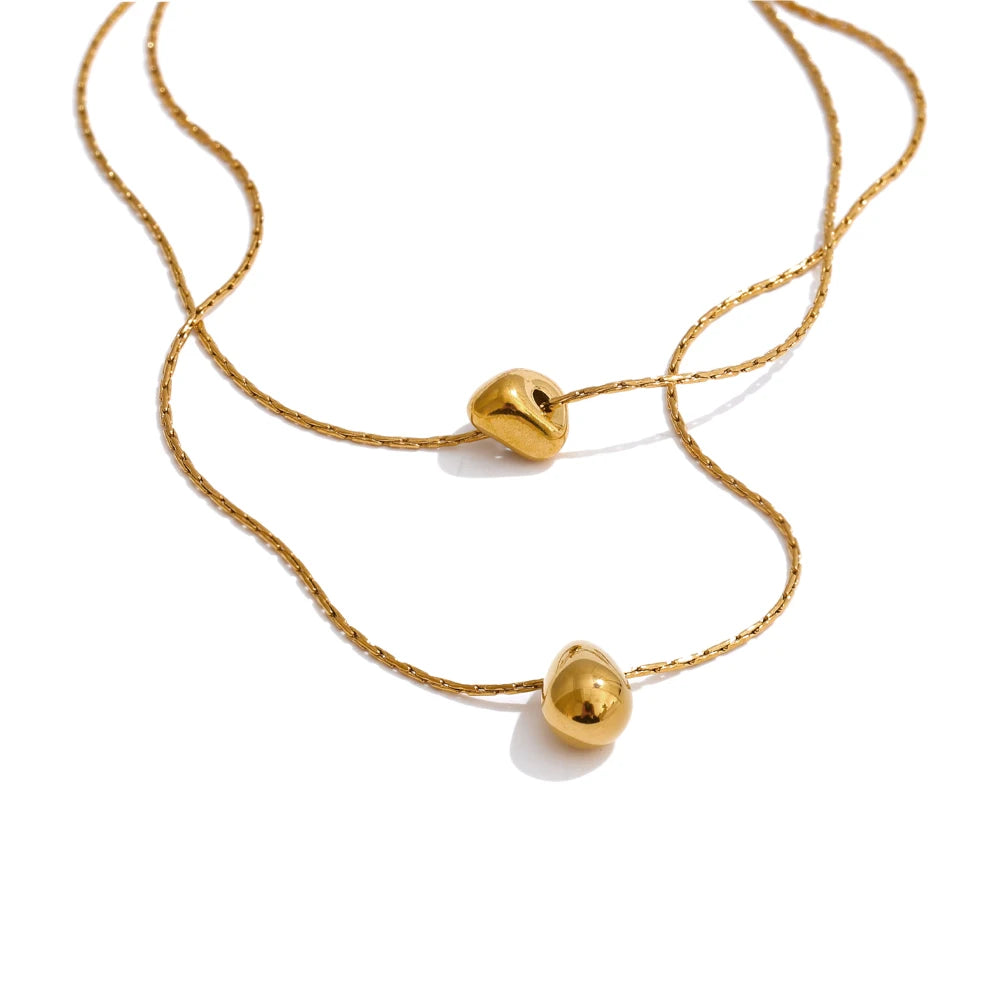 Collar de doble cadena con colgante de gota