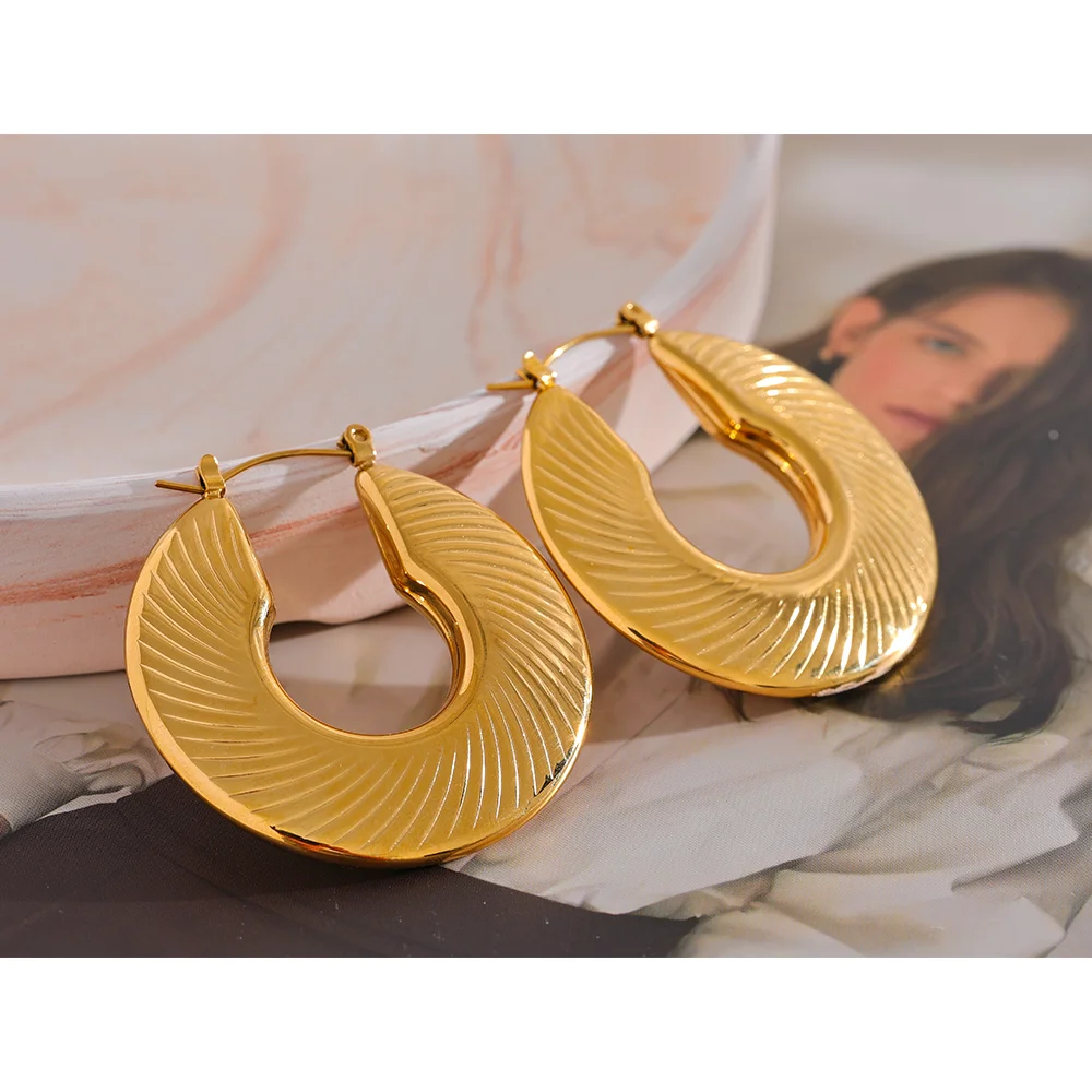 Pendientes de aro dorados texturizados de 40 mm