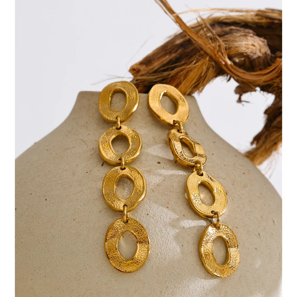 Pendientes largos dorados de círculos · Cerchi