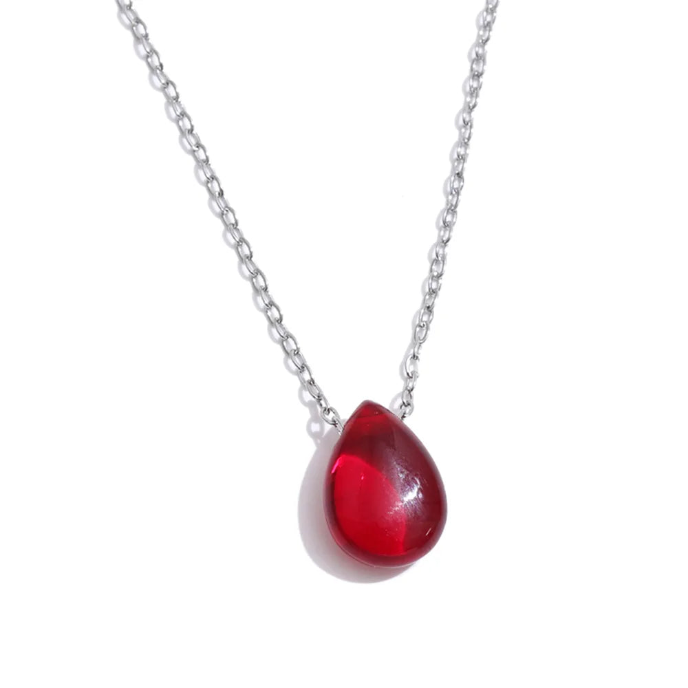 COLLLAR DORADO CON COLGANTE DE RESINA ROJO