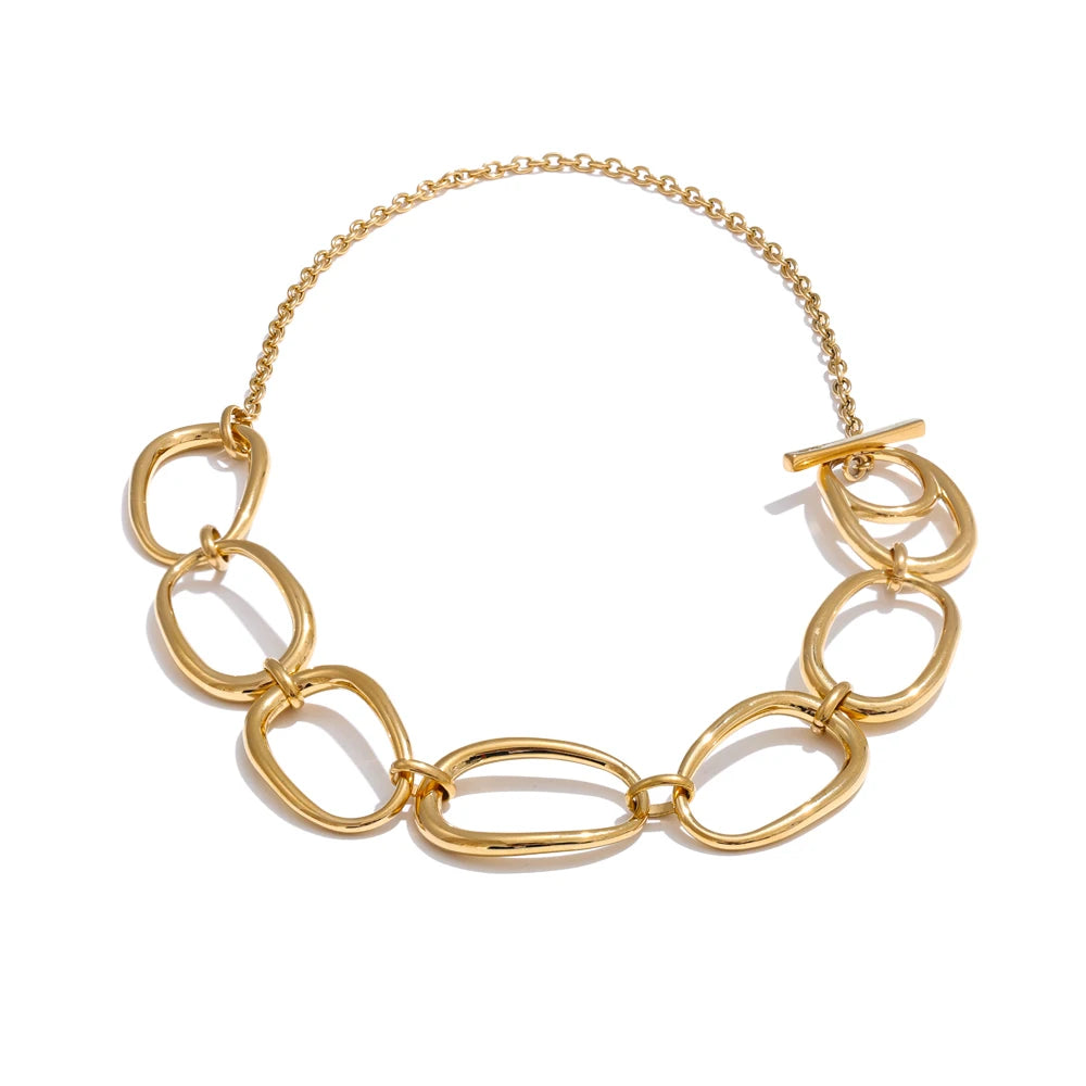 Collar dorado de eslabones orgánicos · Aria
