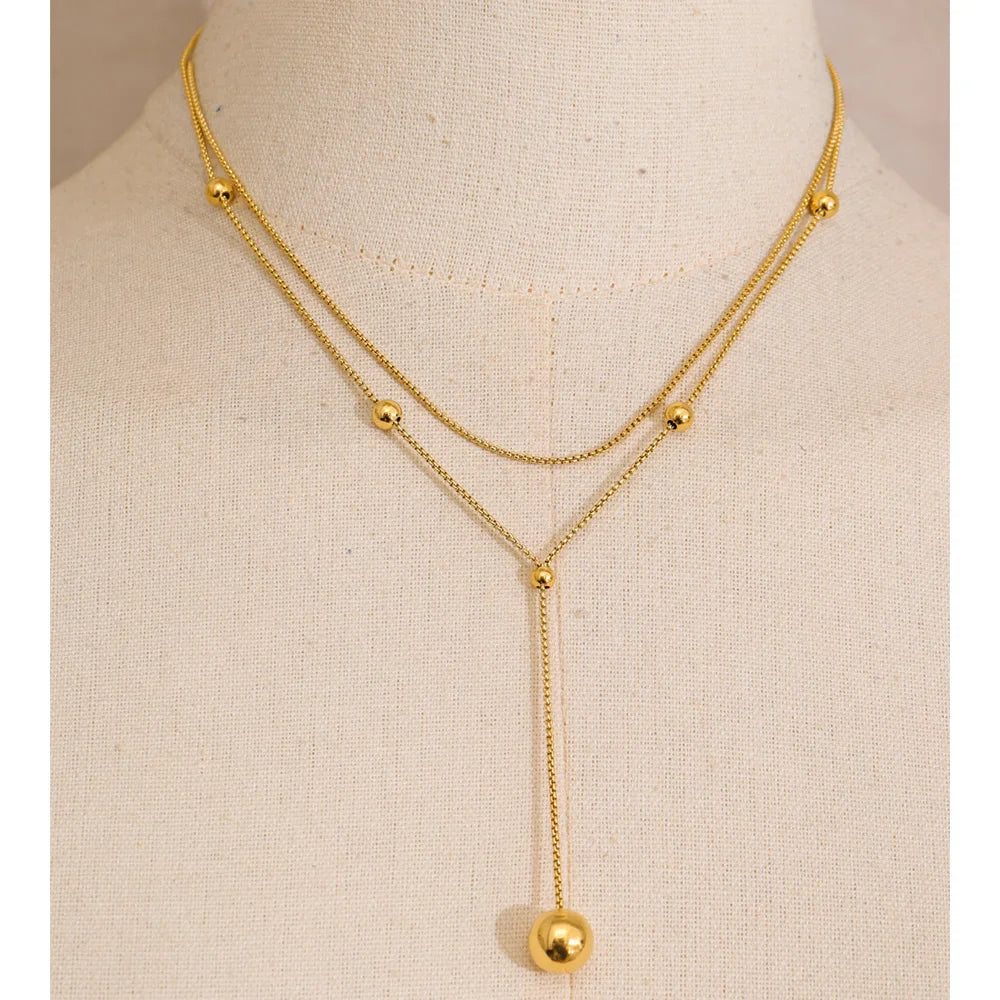 COLLAR DOBLE ASIMETRICO DORADO