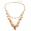 Collar de doble capa con cuentas de resina y dijes