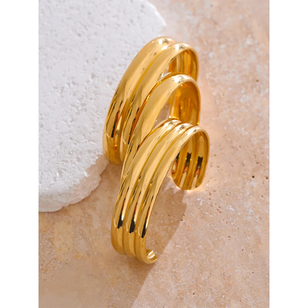 Brazalete abierto dorado de acero inoxidable
